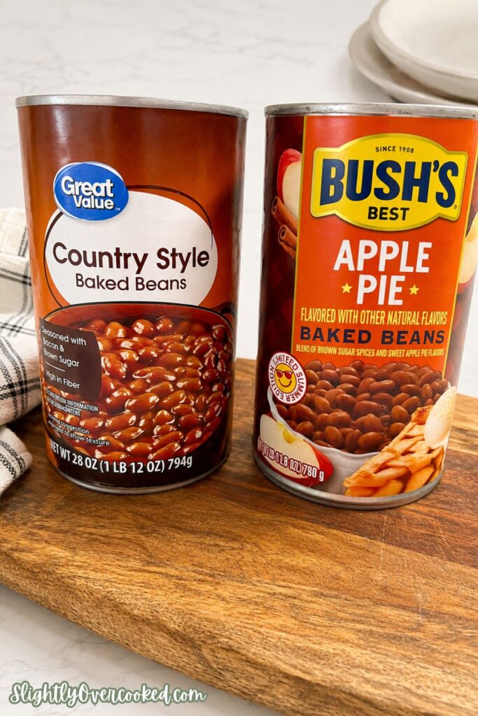 Country-style baked beans warming in a bowl with a spoon