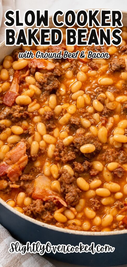 Slow cooker baked beans with ground beef and bacon in a Dutch oven, made with tender navy beans simmered in a rich homemade sweet and savory sauce for the ultimate comfort food side dish or hearty dinner.