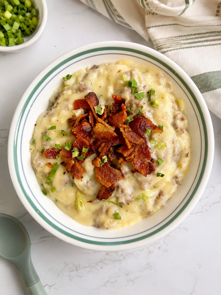 instant pot potato casserole ready to enjoy with crispy bacon and chives sprinkled on top! 