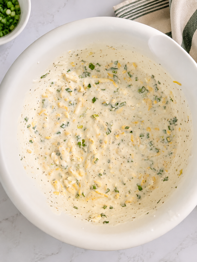 sauce mix with sour cream, ranch seasoning packet, mil and cheese.