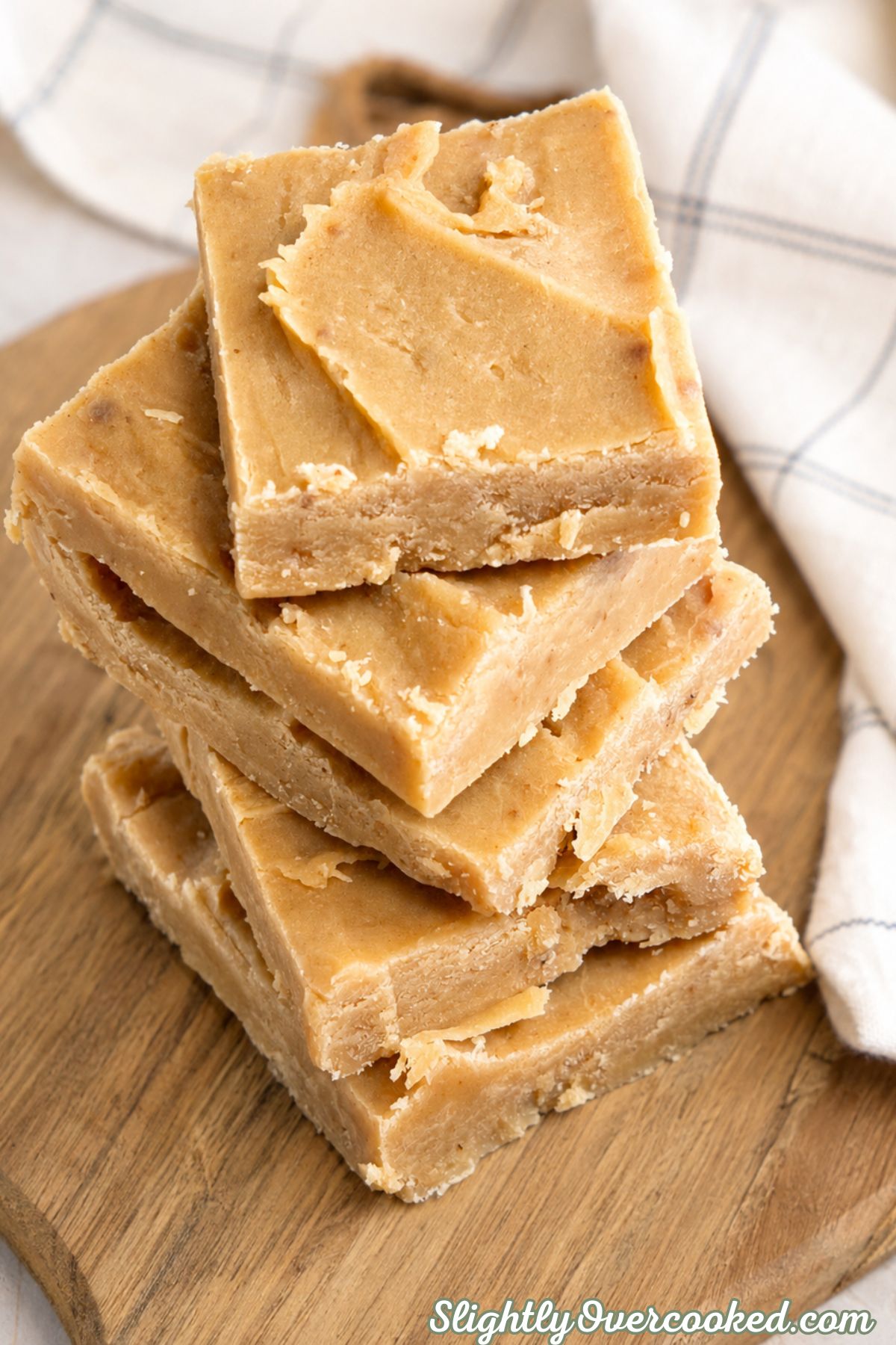 Close-up of homemade peanut butter candy squares showing their creamy, crumbly texture