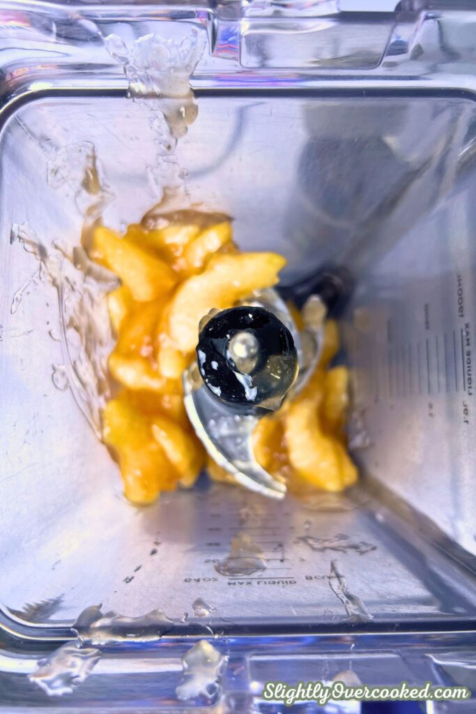 Inside a blender showing the apple pie filling before being blinded.