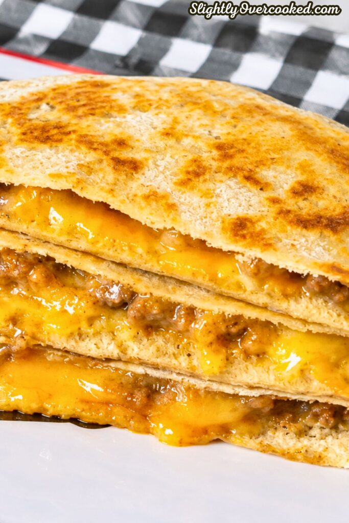 close up of loaded cheesy pita pockets